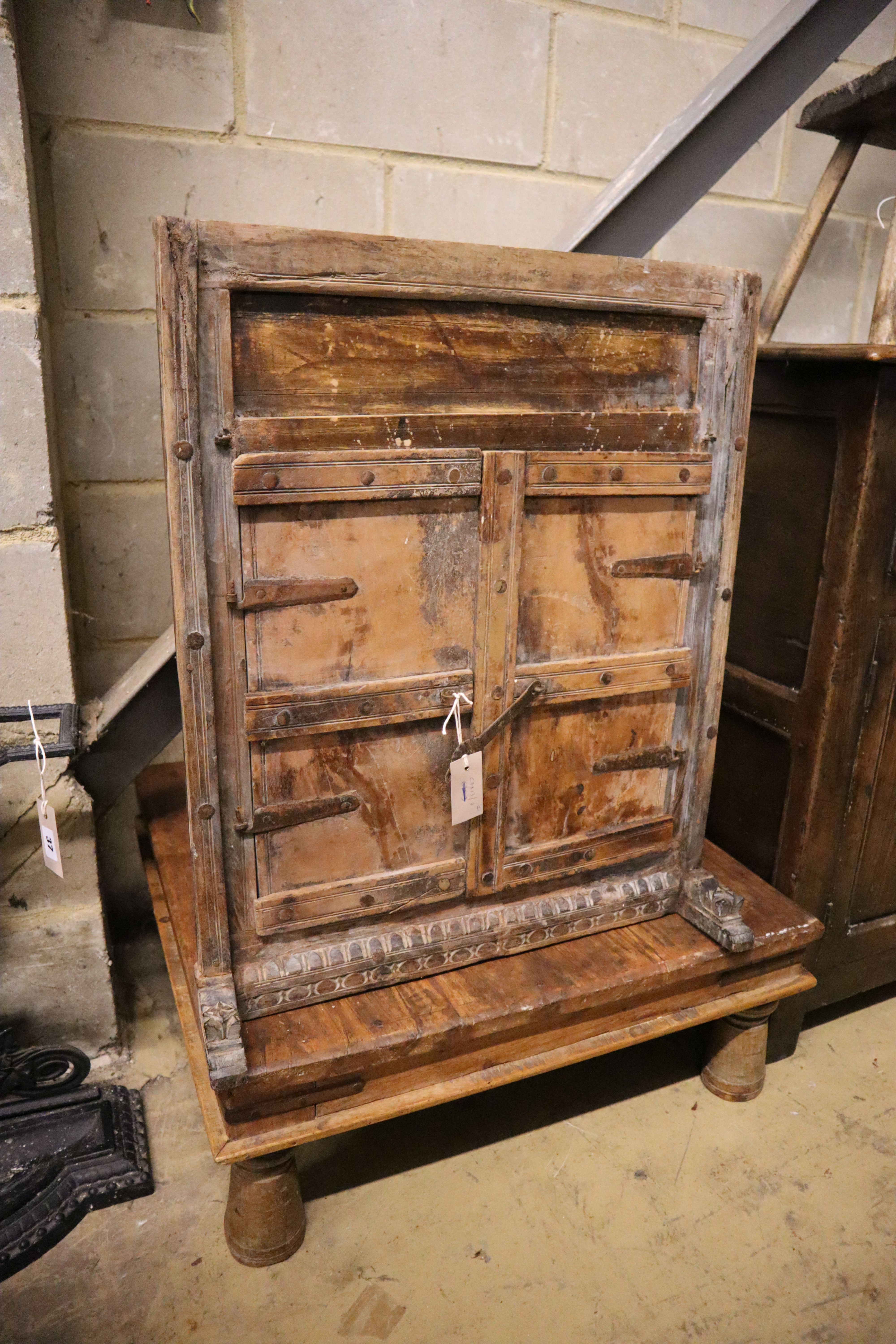 A low occasional table and an Eastern hardwood corner cupboard